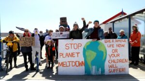 Climate campaigners on Stanley harbour